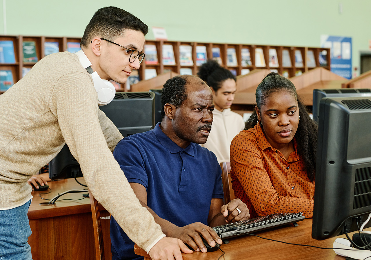 students working together representing the online SLP program at Ithaca College online
